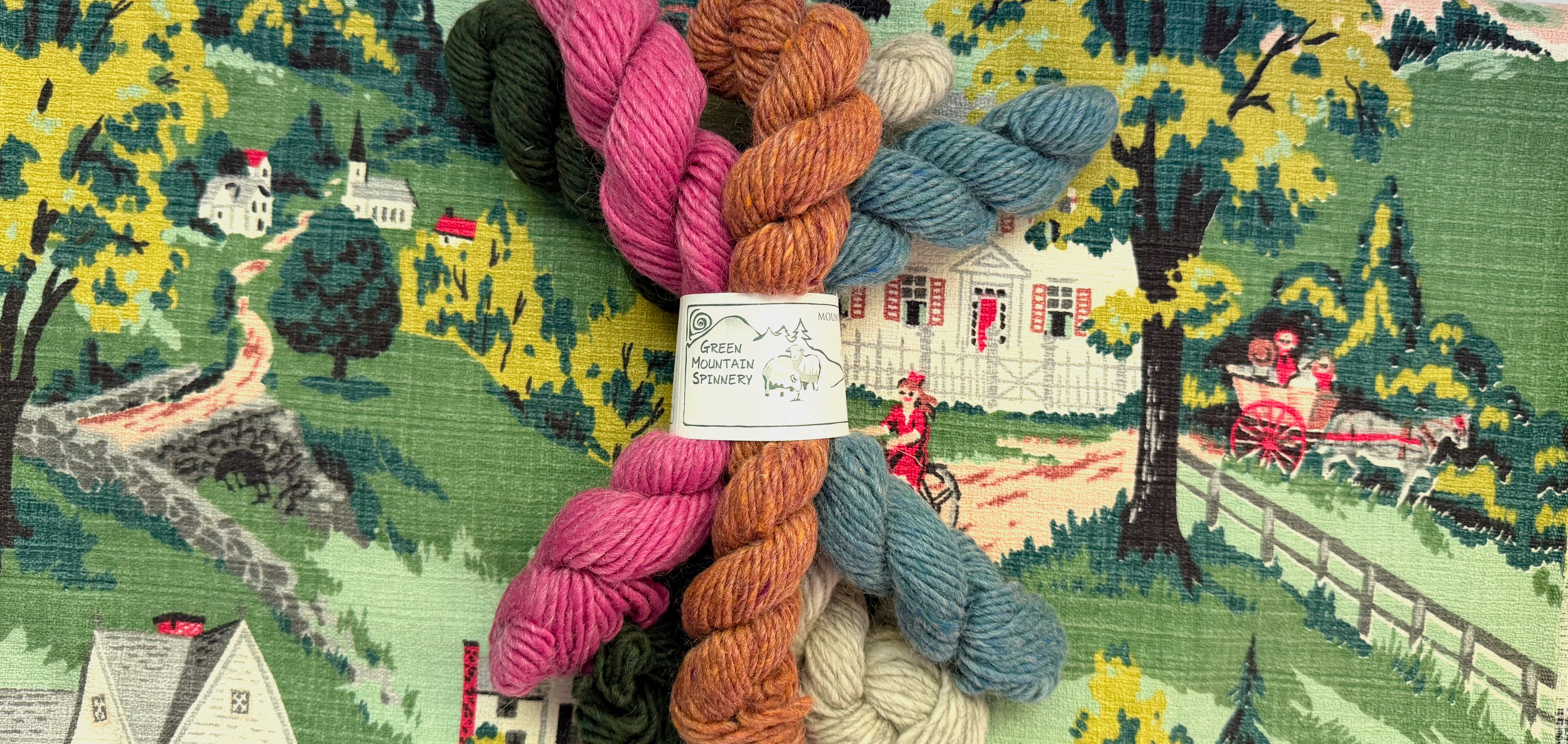 Storybook Everyday — pastel skeins arranged on a storybook cottage scene